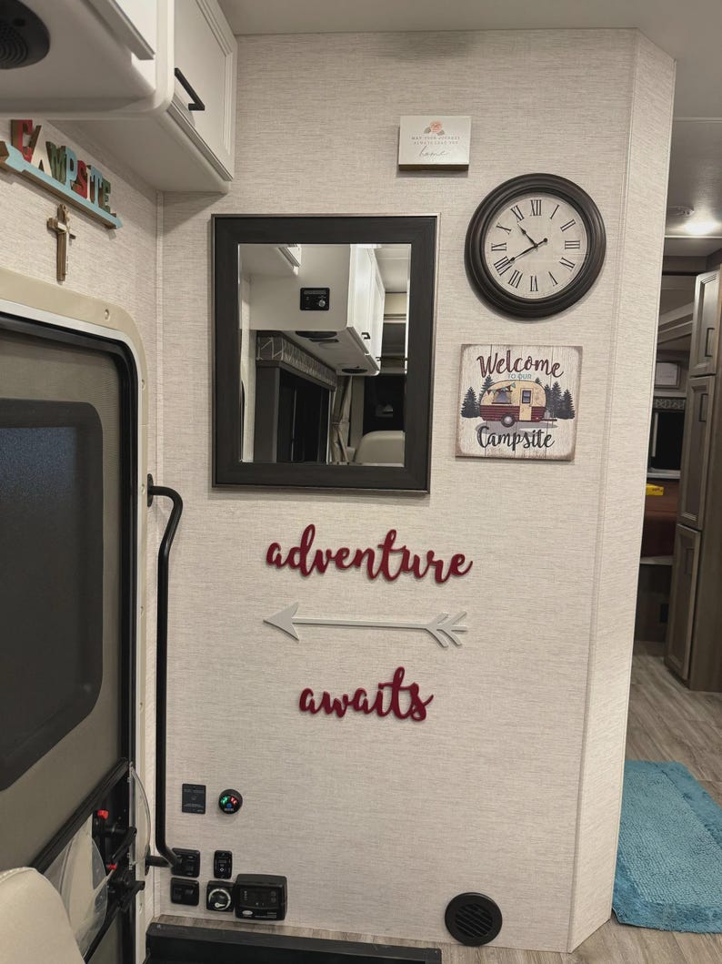 Adventure awaits signs with an arrow. The signs are made of 6mm thick plywood and are suitable for wall decor. Adventure and awaits are painted in Wine red, the arrow - in Silver
