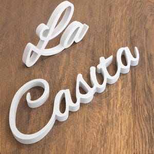 Wooden La Casita signs, painted in White. The signs are made of 3/4" thick plywood (18mm) and they are freestanding.