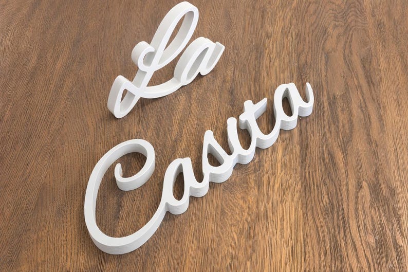 Wooden La Casita signs, painted in White. The signs are made of 3/4" thick plywood (18mm) and they are freestanding.