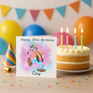 May include: A birthday card with the text "Happy 18th Birthday" and the name "Coop" features a cartoon character. A layered cake with four lit candles sits next to the card. Colourful balloons and confetti decorate the background.