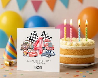 May include: A birthday card with a watercolor illustration of cartoon cars, a large red number 4, and checkered flags. The card reads "Happy 4th Birthday to our Son" and the name "Noah". A birthday cake with four lit candles is in the background.