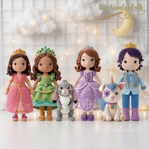 May include: A collection of five handmade crochet dolls including three princesses in pink, green, and purple dresses, a grey rabbit, and a blue-clad prince with a small unicorn companion. Each figure features intricate yarn details and crowns.
