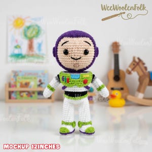May include: A handmade crochet Buzz Lightyear doll, approximately 12 inches tall. The doll features a purple helmet, a green and white spacesuit, and a friendly expression. The doll is a toy and is suitable for children.