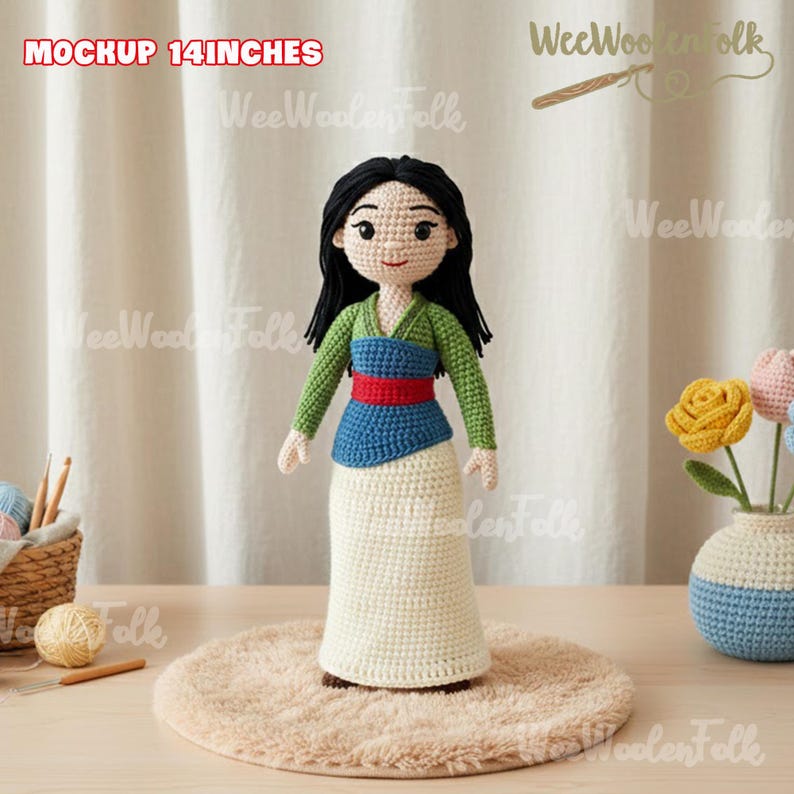 May include: A handmade crochet doll of a character with black hair, wearing a green top, blue and red sash, and a cream-colored skirt. The doll is approximately 14 inches tall. The doll is standing on a round, light brown rug.