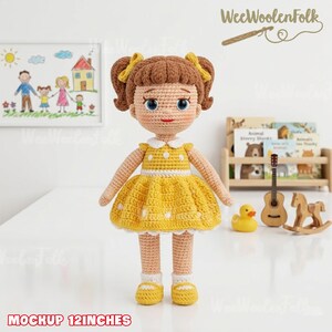 May include: A handmade crochet doll with brown hair styled in pigtails with yellow bows. The doll wears a yellow dress with white polka dots and white collar. The doll is approximately 12 inches tall.