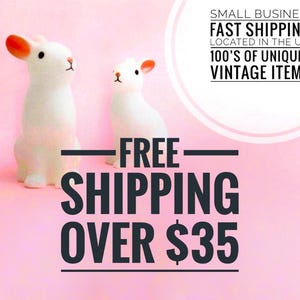 K&ouml;nnte beinhalten: Zwei wei&szlig;e Kaninchenfiguren mit orange get&ouml;nten Ohren und schwarzen Augen. Das Bild enth&auml;lt den Text: SMALL BUSINESS FAST SHIPPING! LOCATED IN THE USA 100'S OF UNIQUE & VINTAGE ITEMS! FREE SHIPPING OVER $35.