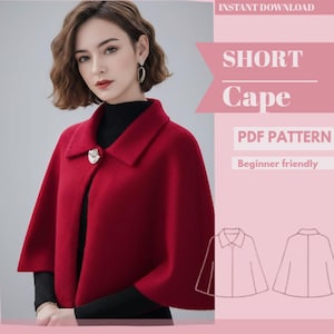 May include: A woman wearing a red short cape with a collar and a decorative clasp. The cape is part of a PDF pattern, labeled as beginner-friendly, with the words "SHORT Cape" in a pink banner.