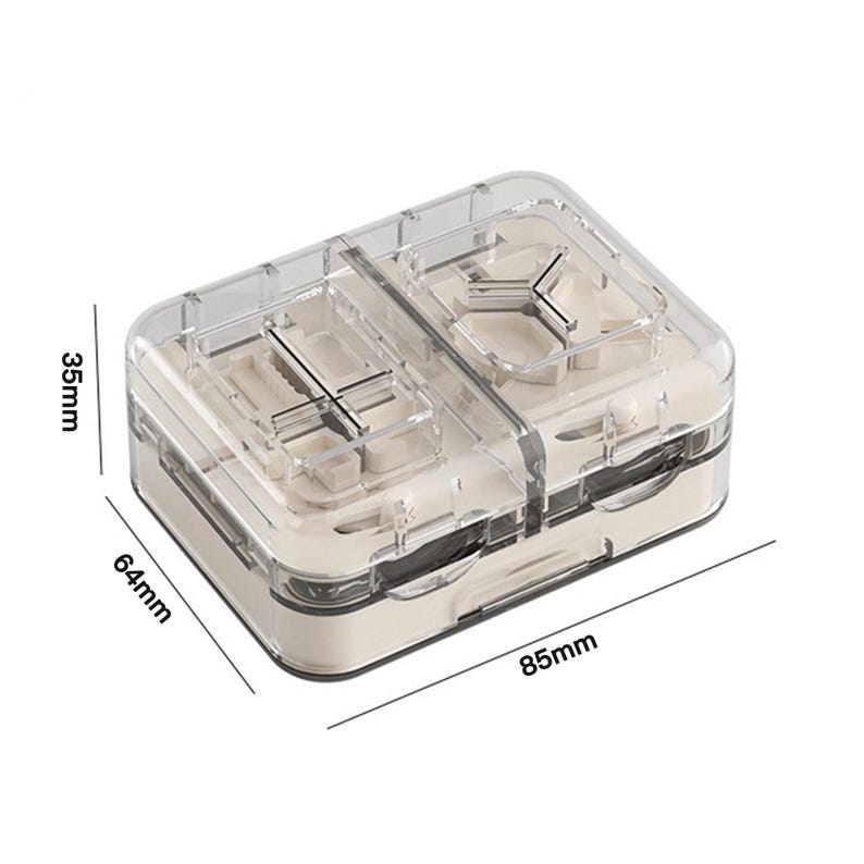 May include: A clear, rectangular pill organiser with two compartments. The organiser is 8.5 cm long, 6.4 cm wide, and 3.5 cm tall. It has a beige base and a clear lid, with measurements labeled in millimeters.