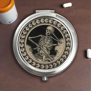 Skeleton Pill Box: Silver Tone Vitamin Storage with Mirror Lid