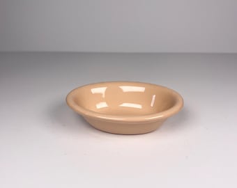 Vintage peach-colored soap dish made in England