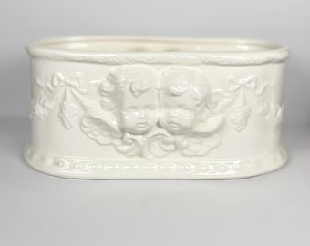 Vintage planter with cherub, cherub decoration
