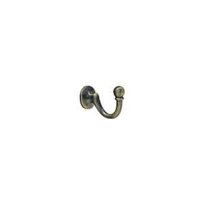 May include: A wall-mounted hook with a curved design and a rounded ball tip, finished in an antique brass tone. The hardware features a circular base plate for attachment and a smooth, metallic surface with subtle dark highlights throughout.