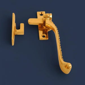 May include: A rustic wooden sign with the words "Welcome to our home" in white lettering. The sign has a distressed finish and a simple, inviting design, ideal for front door decor.