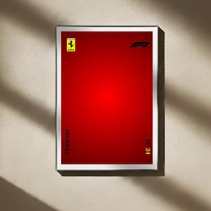 May include: A framed poster with a red gradient background. The Ferrari logo and the F1 logo are at the top. The word "FERRARI" is printed vertically on the left side, and "SF 24" is on the right side. The poster is in a white frame.
