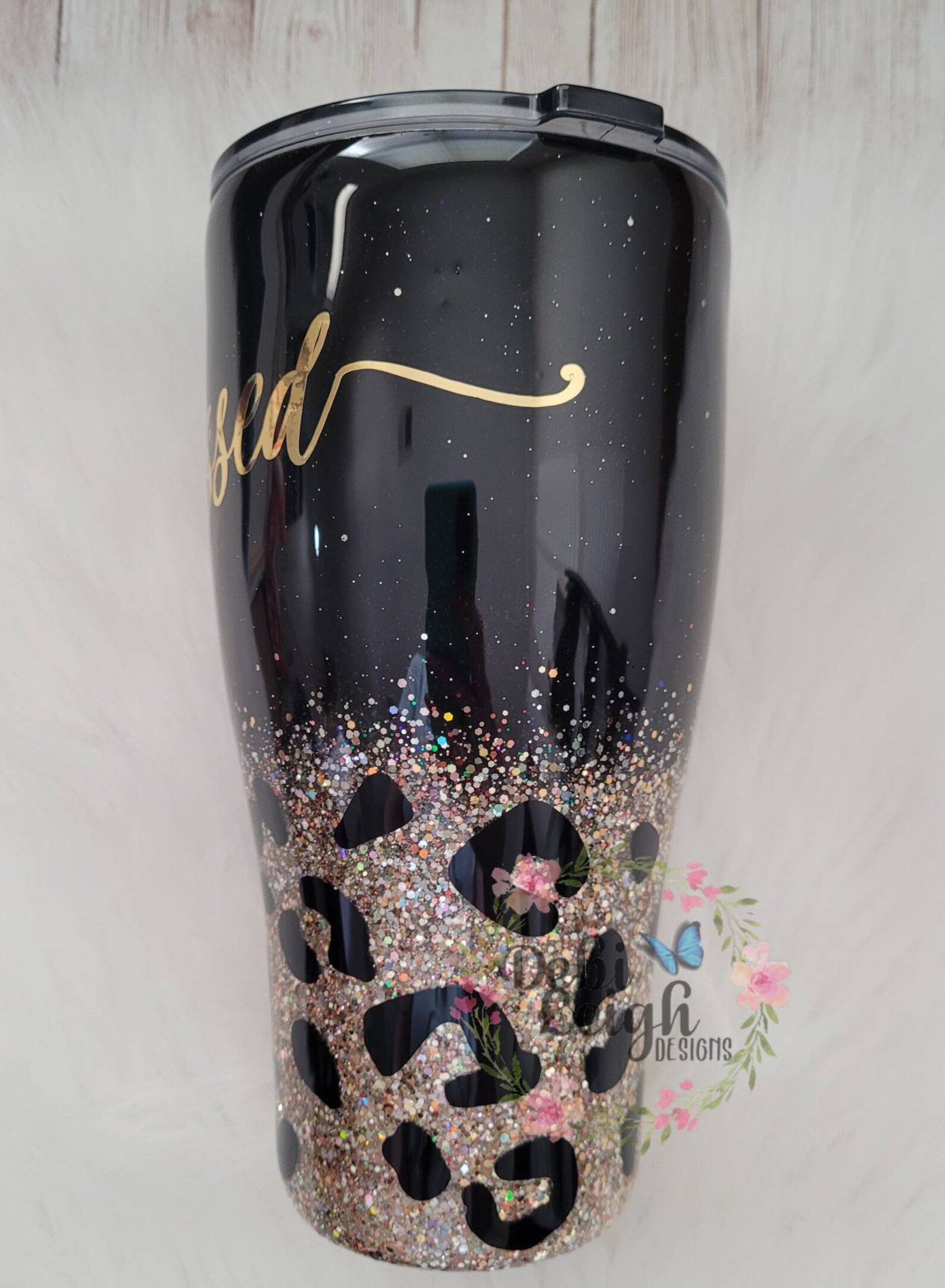 30 oz Insulated Black Tumbler with Argentina Cow Leather Beaded Arrow Sleeve. main image 0