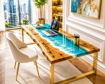 May include: A rectangular desk featuring a live edge wood slab with a central blue resin inlay mimicking ocean waves and white foam, supported by gold metal legs. A cream-colored upholstered chair with gold legs is positioned at the desk.