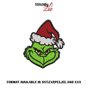 May include: An embroidered design of the Grinch's face, wearing a red Santa hat with white trim. The Grinch is green with a black outline. The image includes the text "FORMAT AVAILABLE IN DST,EXP,PES,JEF, AND XXX".