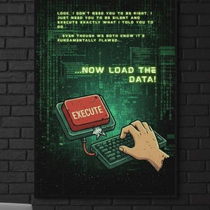 Könnte beinhalten: Gerahmter Digitaldruck mit roter "EXECUTE"-Taste und Hand, die eine Tastatur bedient, vor grünem Binärcode-Hintergrund. Der Text "NOW LOAD THE DATA!" ist zu sehen. Das Kunstwerk ist an einer schwarzen Backsteinmauer befestigt.
