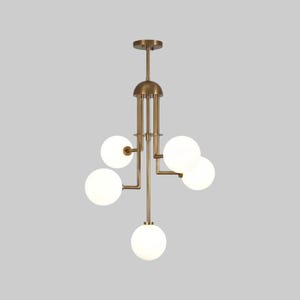 May include: A modern chandelier with a brass finish and five spherical, frosted glass shades. The fixture has a central stem with multiple arms extending to hold the lights. The design is minimalist and elegant, suitable for various interior styles.
