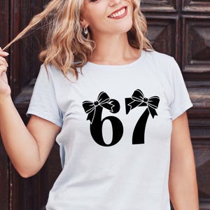 67 meme 67 SVG Cute 67 png 6-7 meme design, Cricut, Png, Svg, sublimation, Six Seven Png, Six Seven Shirt design Viral 6/7 Png Funny Saying
6 7 Meme png ,6 7 png , six seven Coquette Bow Meme 67 , 6 7 shirt for kids PNG, six seven Bow Meme Png, 67 Birthday Png
I Survived 67 Days of School SVG PNG – Funny Teacher Student Meme Shirt Design | Digital Download for Cricut & Sublimation