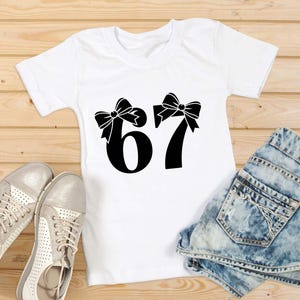 67 meme 67 SVG Cute 67 png 6-7 meme design, Cricut, Png, Svg, sublimation, Six Seven Png, Six Seven Shirt design Viral 6/7 Png Funny Saying
6 7 Meme png ,6 7 png , six seven Coquette Bow Meme 67 , 6 7 shirt for kids PNG, six seven Bow Meme Png, 67 Birthday Png
I Survived 67 Days of School SVG PNG – Funny Teacher Student Meme Shirt Design | Digital Download for Cricut & Sublimation