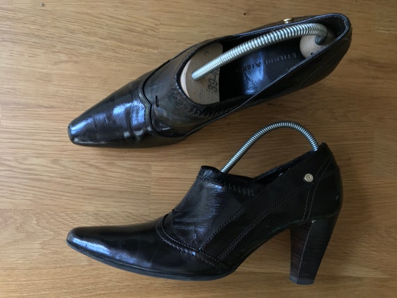 size 2 black pumps