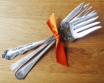 Vintage mismatched silverplate serving forks, set of 3.