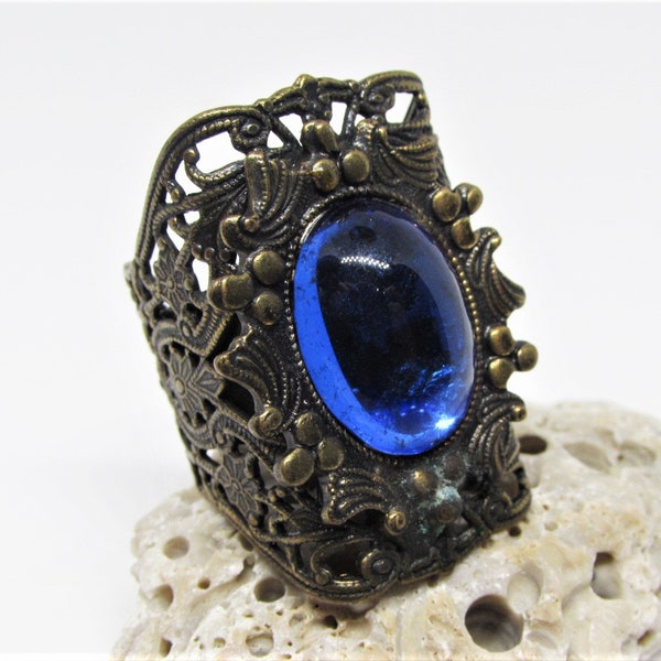 One-of-a-Kind Vintage Designer KIM CRAFTSMAN Large Brass Floral Filigree Ring, Blue Glass Cabochon, Ornate Wide Flower Band, 1960's Jewelry