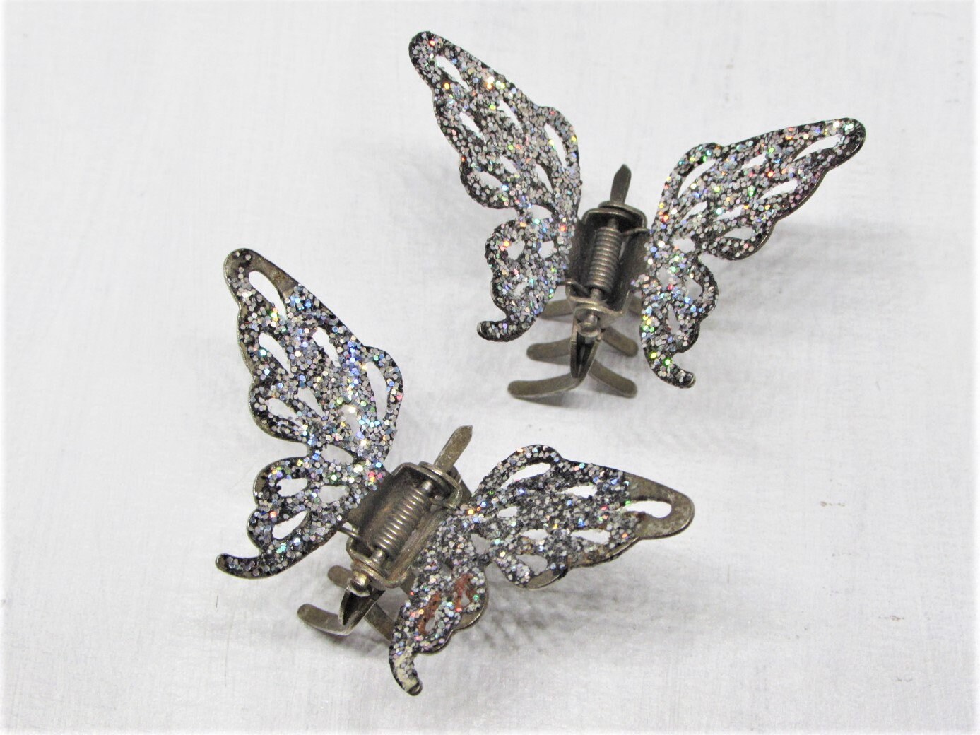 A Six Pack Of Pretty Silver Glittery Metal Micro Butterfly Claw Clips For Hair 