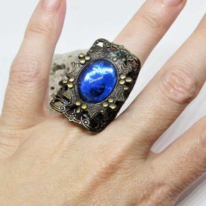 Vintage Designer KIM CRAFTSMAN Large Cocktail Ring- Blue Glass Cabochon- Flower Floral Antique Brass Filigree- 1960s Costume Fashion Jewelry