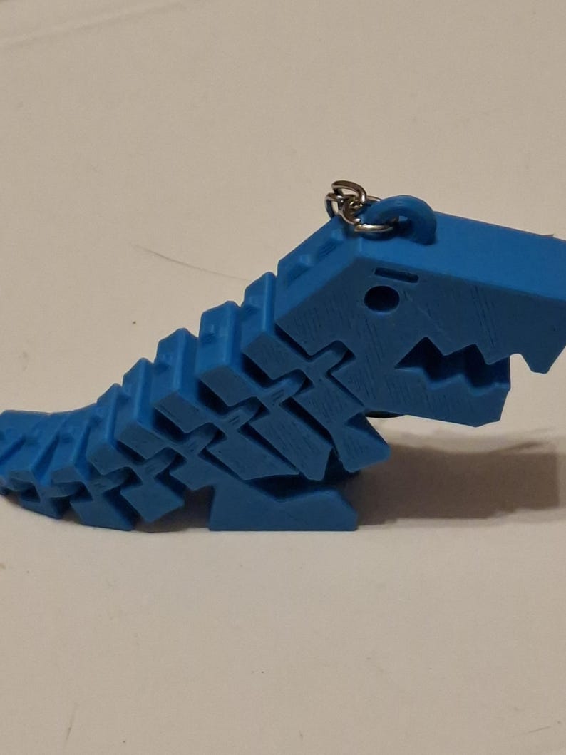 Dinosaur fidget keychain bild 3