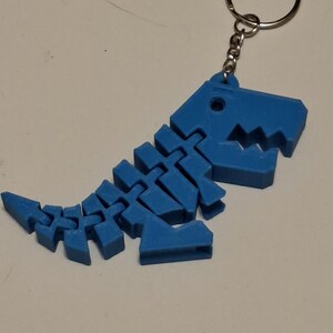 Dinosaur fidget keychain bild 1