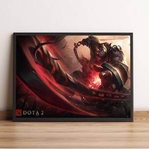 May include: Framed artwork featuring a dynamic illustration from Dota 2. The image showcases a monstrous character with fiery details, set against a backdrop of red and brown hues. The Dota 2 logo is visible in the lower left corner.