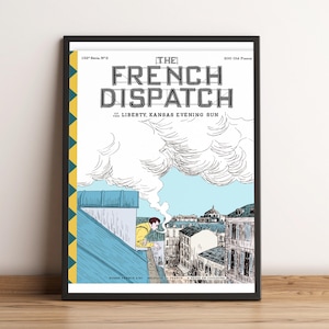 May include: Framed art print of "The French Dispatch" newspaper cover. The illustration features a rooftop scene with a person in a yellow jacket, overlooking a city. The title is in bold, black letters, with the text "Liberty, Kansas Evening Sun".