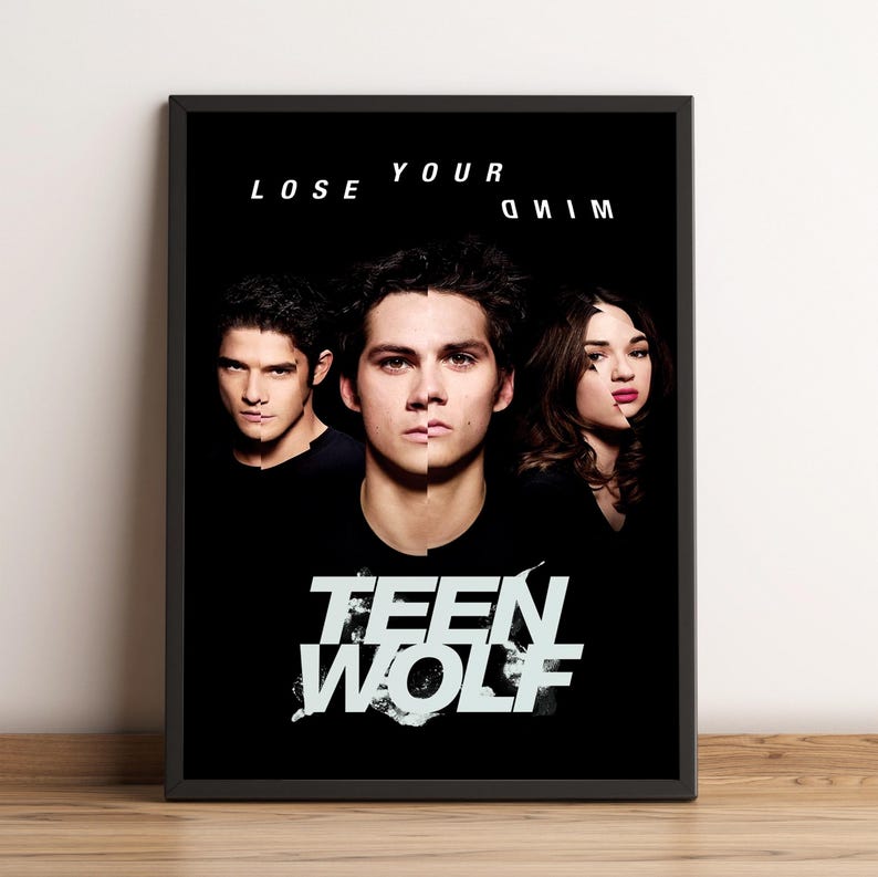 May include: A framed poster featuring three people with split faces against a black background. The text "LOSE YOUR MIND" is above the subjects, and "TEEN WOLF" is written in a stylized font below.