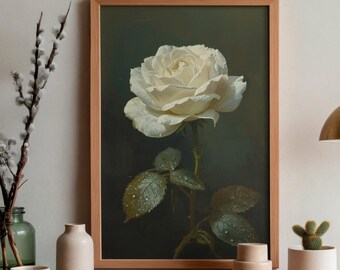 May include: A framed art print featuring a close-up of a white rose with water droplets. The rose is set against a dark green background. The wooden frame adds a natural touch to the floral artwork. The print includes green leaves.