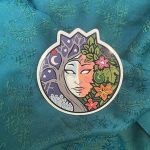 May include: A set of three ceramic mugs with a speckled, matte finish. The mugs are in shades of cream, light gray, and dark gray. Each mug has a simple, minimalist design and a rounded handle. Perfect for coffee or tea.