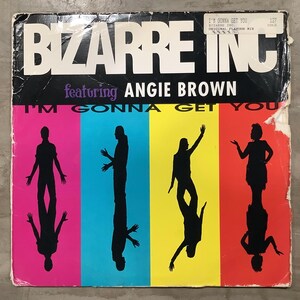 May include: Album cover for "I'm Gonna Get You" by Bizarre Inc featuring Angie Brown. The cover features the band's name in large white letters above the title. The background is divided into four colored sections with black silhouettes of people.