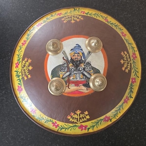 Hand Painted Leather Sikh Dhal Wall Decor – Baba Deep Singh Ji Nihang Phoola ji