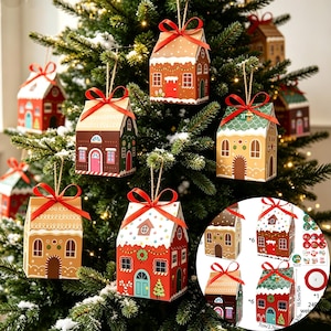 May include: A set of hanging gingerbread house gift boxes featuring red ribbons and twine loops. The boxes are decorated with colorful illustrations of doors, windows, and festive patterns. A circular inset shows the box designs and sticker sheets.