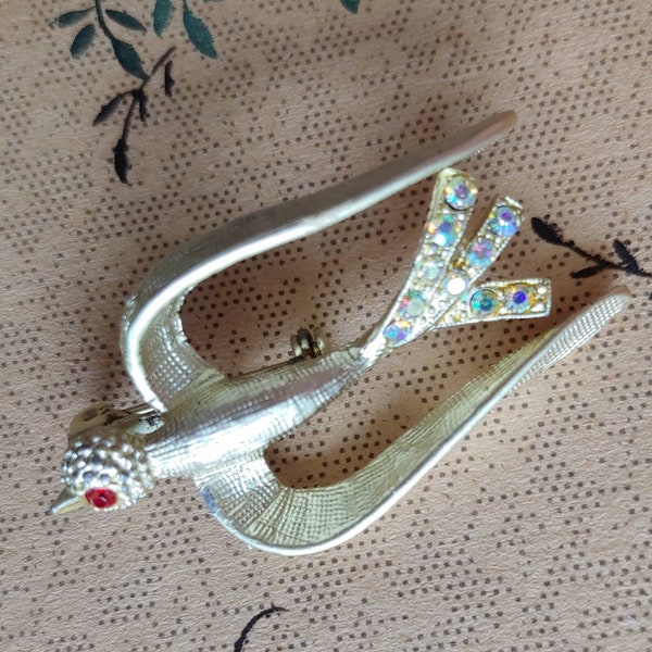 Vintage 1960s Peace Dove Brooch In Gold With Red Rhinestone Eye And Aurora Borealis Tailfeathers Mid Century MCM Mod