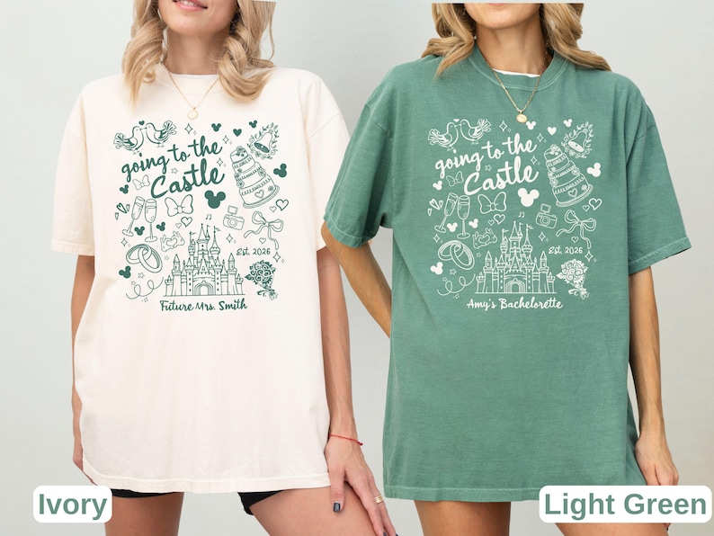 May include: Two t-shirts, one ivory and one light green, feature a whimsical design with the text "going to the Castle." The design includes a castle, Mickey Mouse ears, and wedding-themed illustrations. One shirt says "Future Mrs. Smith," the other says "Amy's Bachelorette."