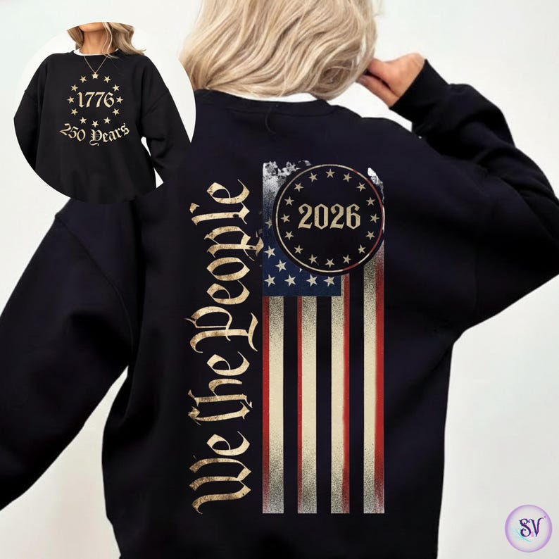 May include: Black sweatshirt with a distressed American flag design on the back, featuring the text "We the People" in gold script. The front of the sweatshirt has a circular design with the text "1776 250 Years".