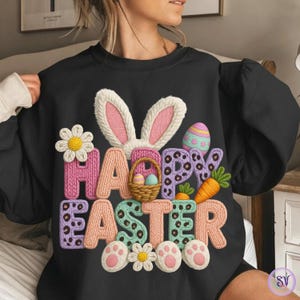 May include: Black sweatshirt with a colorful "Happy Easter" design. The design includes bunny ears, Easter eggs, a basket of eggs, carrots, flowers, and paw prints. The letters are in various colors and patterns.