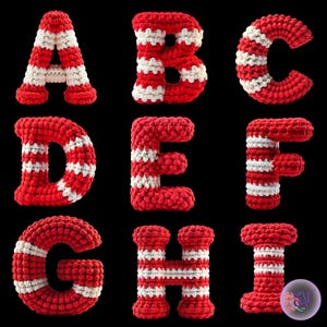May include: Nine crochet letters, A through I, are displayed against a black background. Each letter is red with white stripes, giving a candy cane appearance. The letters are thick and three-dimensional, showcasing a handmade craft style.