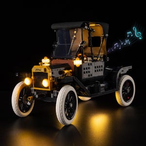 Könnte beinhalten: Ein Set aus drei Keramikbechern mit gesprenkelter, matter Oberfläche. Die Becher sind in Creme-, Hellgrau- und Dunkelgrautönen gehalten. Jeder Becher hat ein schlichtes, minimalistisches Design.