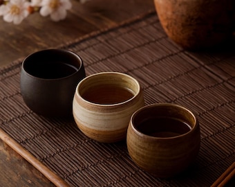 Japanse keramische sakekop | Handgemaakte zwarte steengoedespresso, thee