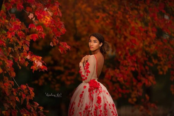 Cream dress with red clearance flowers