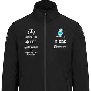 May include: Black zip-up jacket with multiple logos, including AMG, UBS, Crowdstrike, Hewlett Packard Enterprise, Petronas, INEOS, and TeamViewer. The jacket has a stand-up collar and two side pockets. A sleek, sporty design.