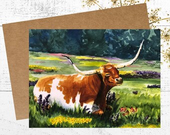 Longhorn Cow Card, Watercolor Painting of a Texas Longhorn Lying Peacefully in a Meadow of Flowers, 5x7 Personalized Greeting Card